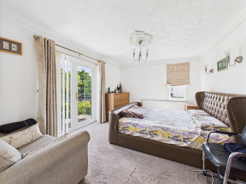 Master bedroom suite with dressing area and en-suite bathroo