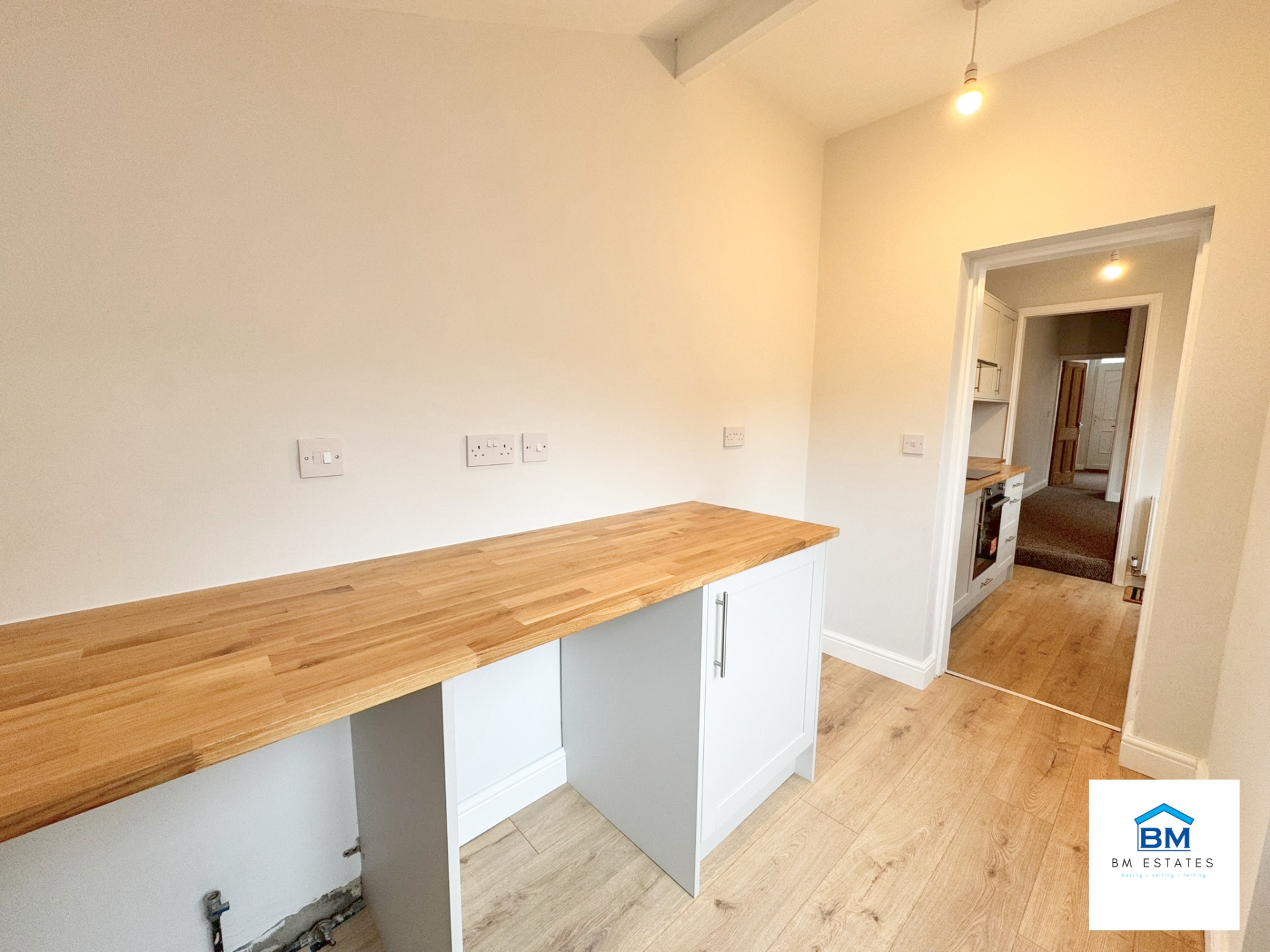 Utility room facing kitchen