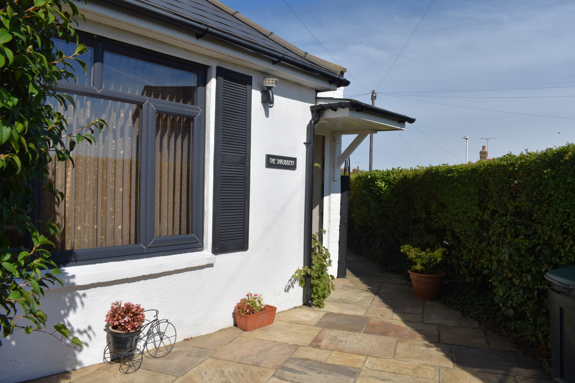 COURTYARD TO FRONT ENTRANCE