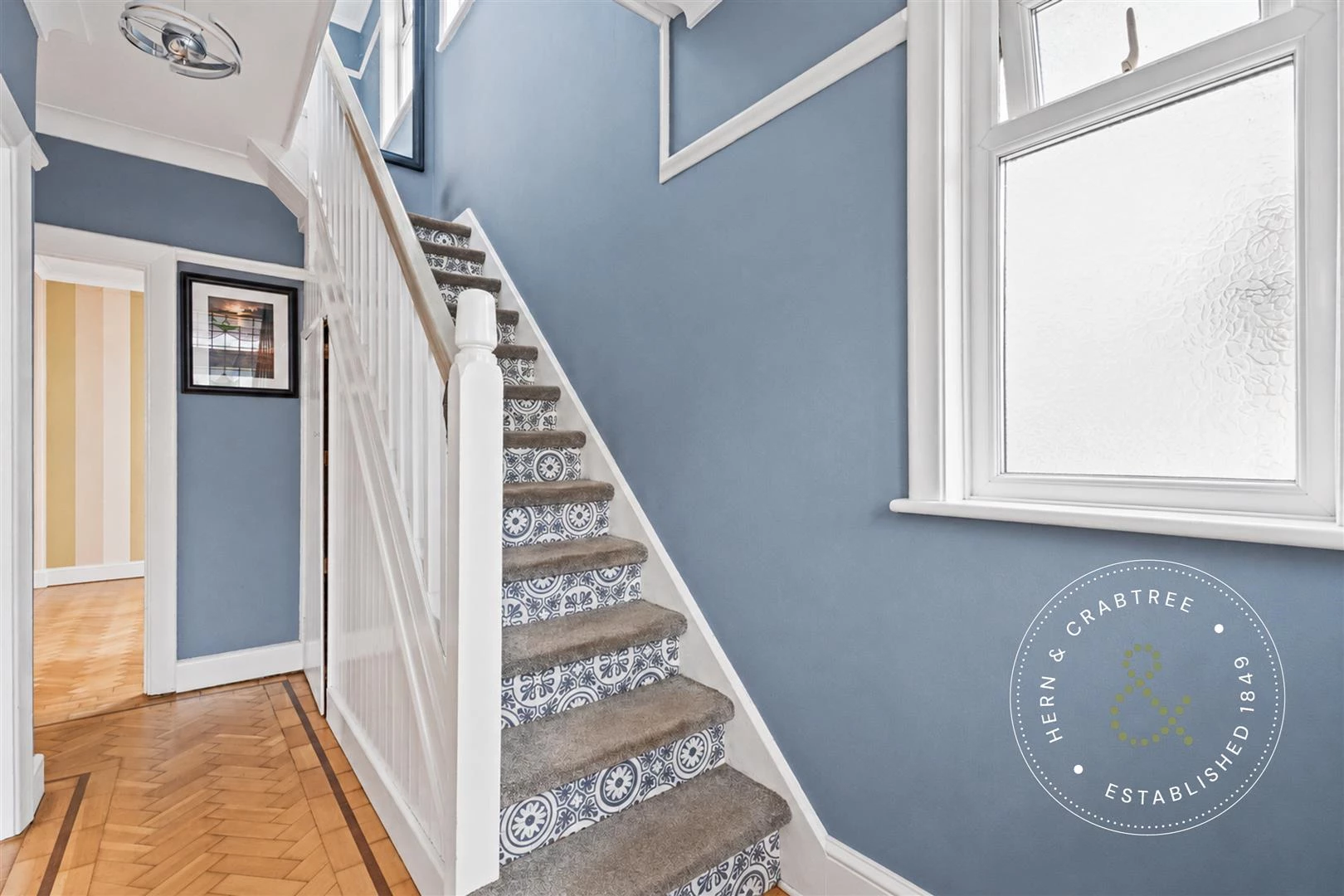 Staged Blue-Grey Stairwell with Frosted Window.jpg