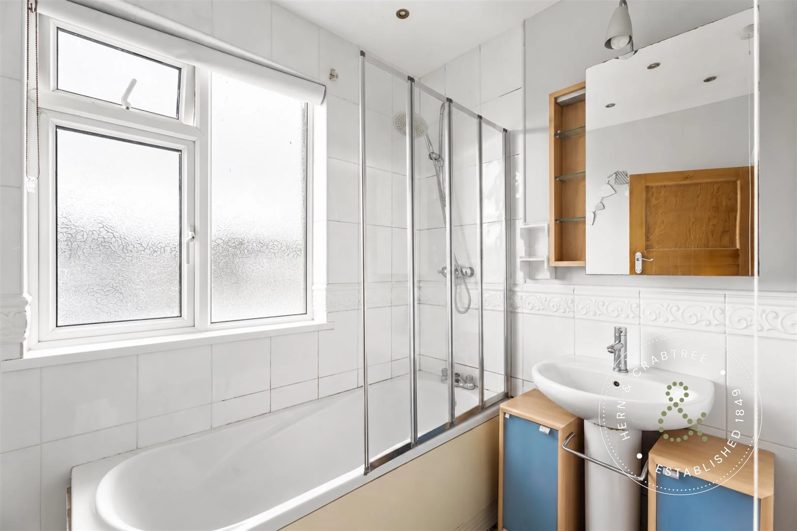 Bright Modern Clutter-Free Bathroom.jpg
