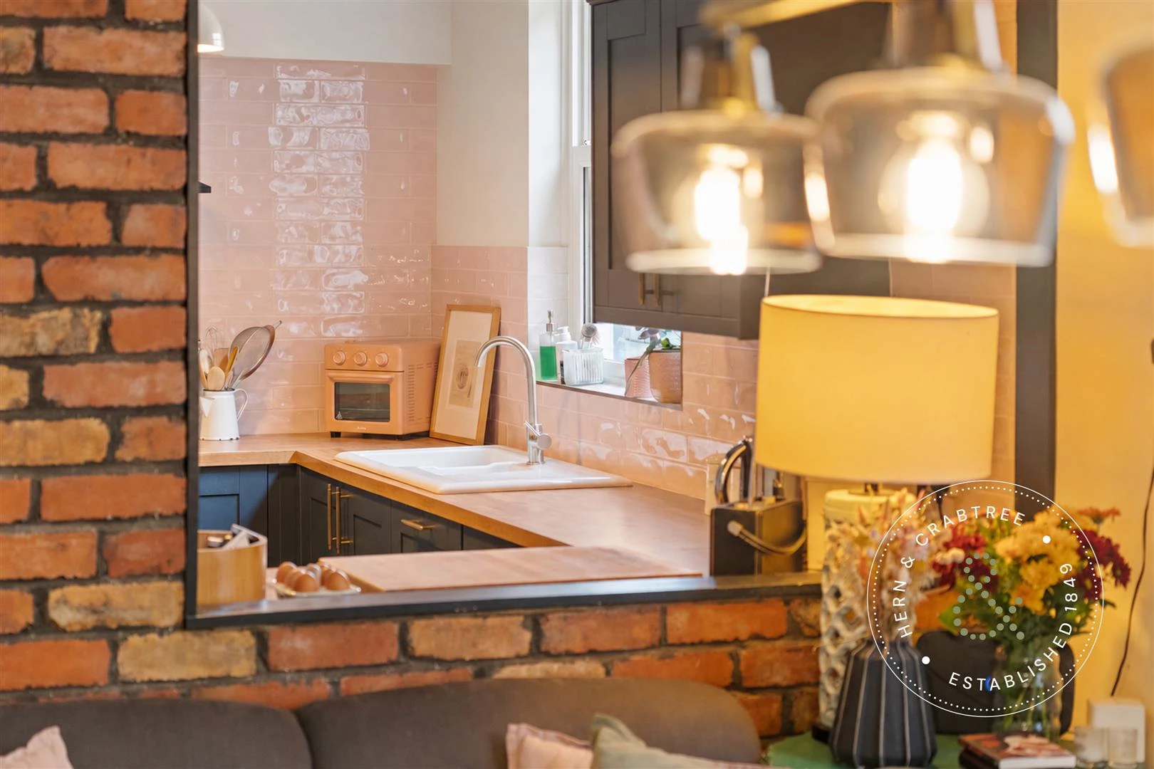 Cozy Brick-Framed Kitchen Pass-Through.jpg
