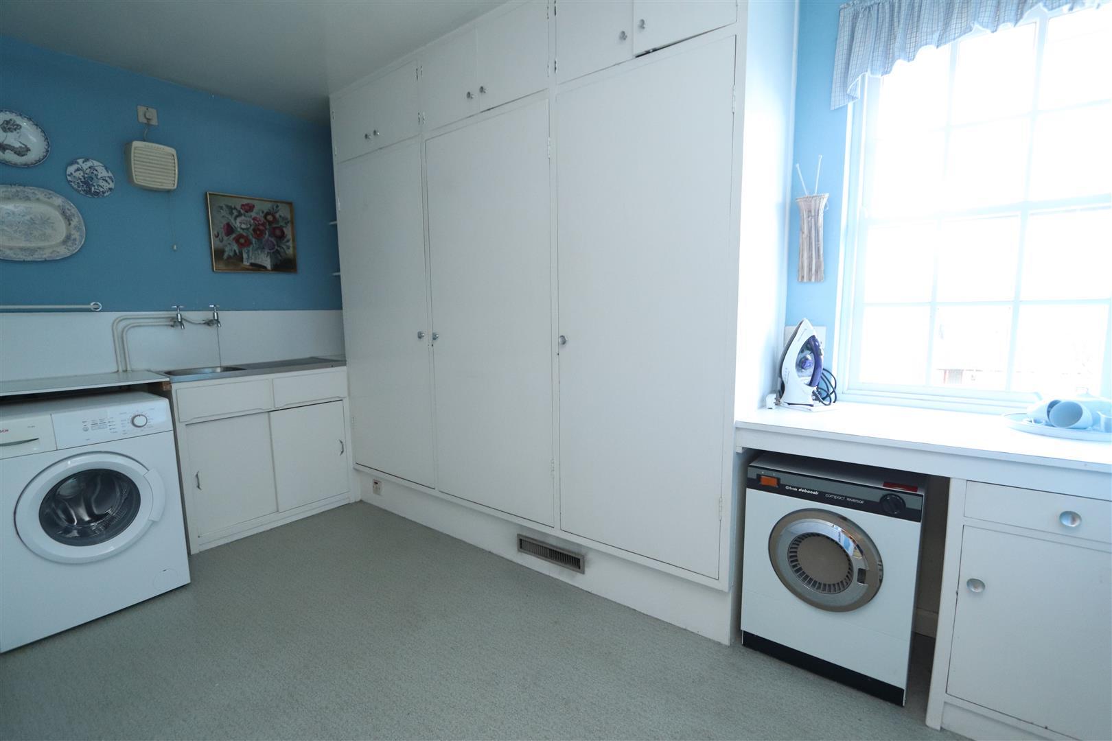 Laundry Room/Bedroom Five