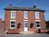 Front of House, entrance gate to left Front of House, entrance gate to left